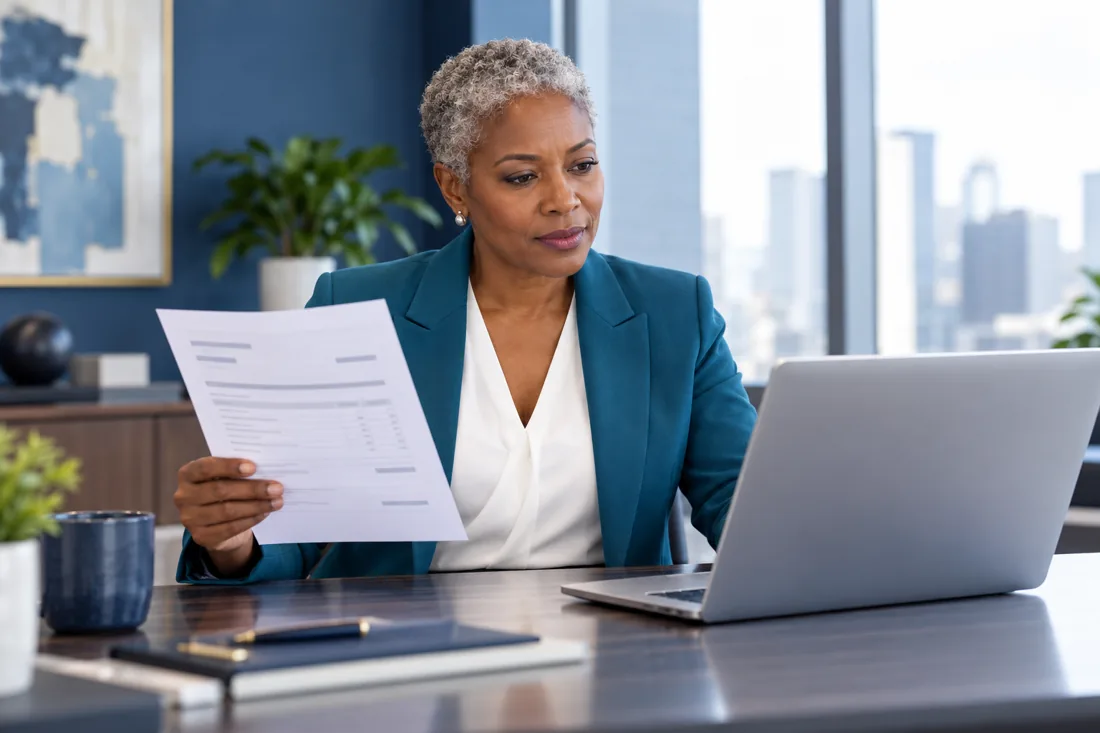 Professional reviewing administrative supporting documents for b2b commerce